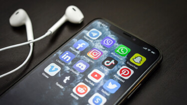Social media icons on screen of iPhone 11 Pro